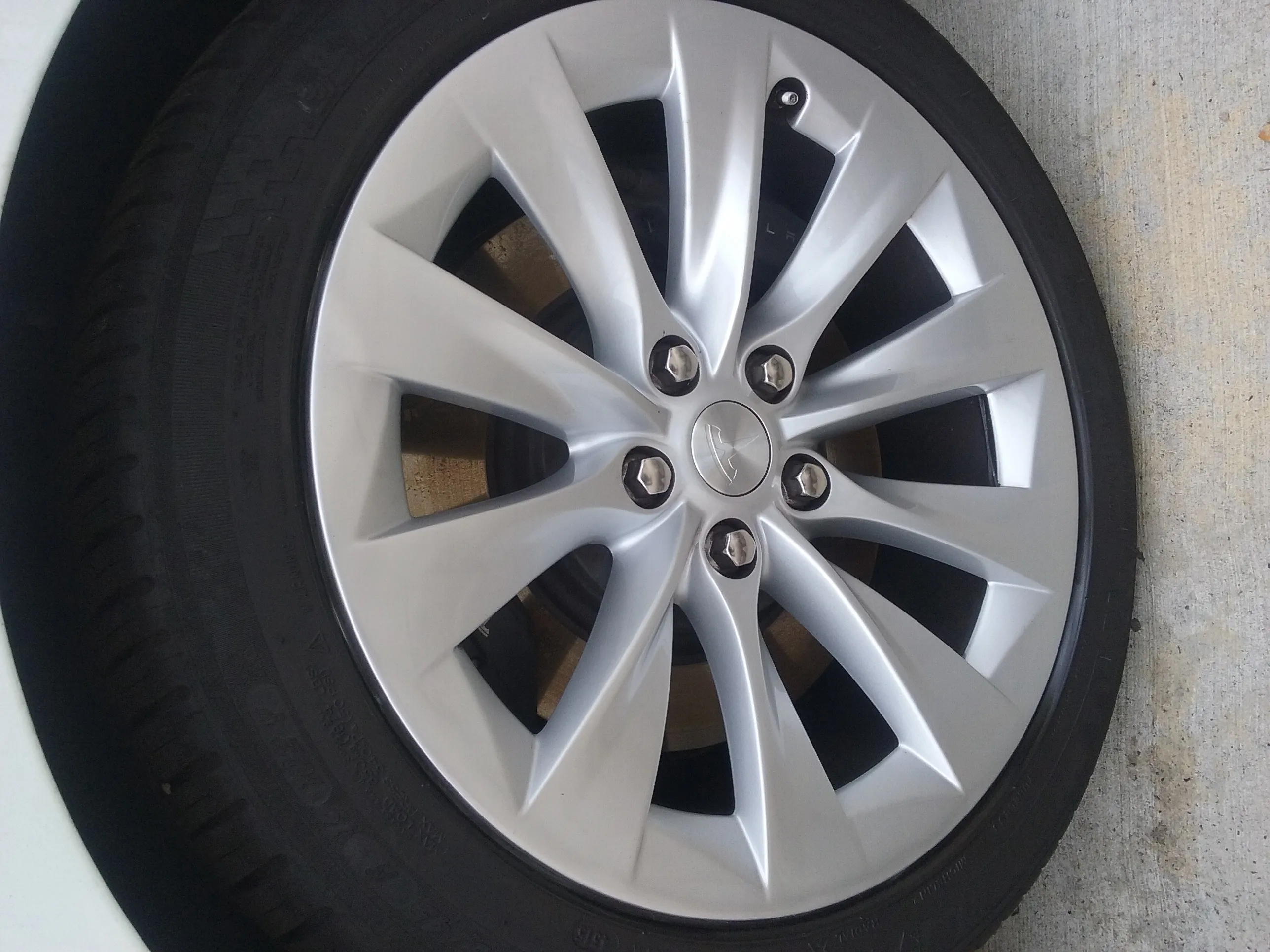 Tesla alloy wheel repair before and after